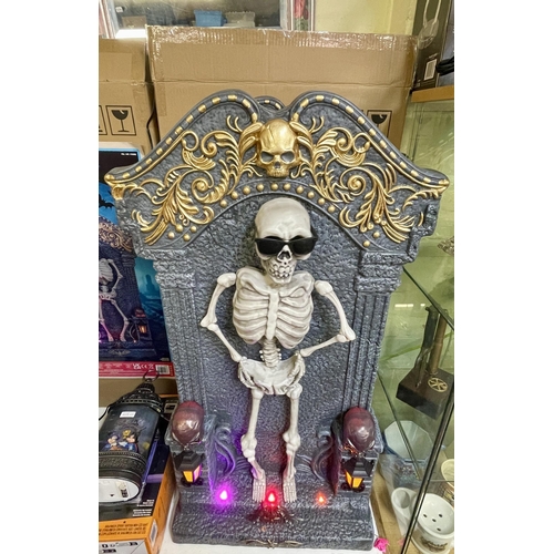 179 - BOXED 3FT ANIMATED SKELETON TOMBSTONE WITH LED LIGHTS AND MUSIC