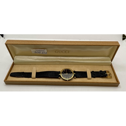 274 - GENTS GUCCI LEATHER STRAPPED QUARTZ WRISTWATCH, LEATHER AND GILT WITH ORIGINAL GUCCI BOX