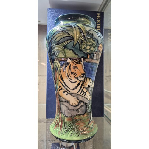 343 - A Moorcroft Pottery vase of footed form decorated in the Ranthambore pattern designed by Sian Leeper... 