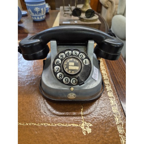 374 - VINTAGE FTR DIAL TELEPHONE