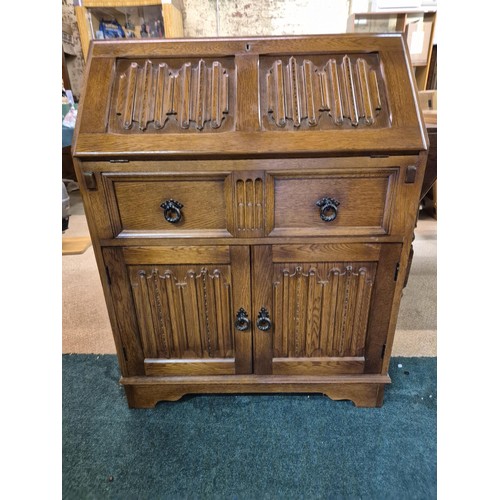 220 - AN OLD CHARM DROP FRONT OAK DESK BUREAU SINGLE DRAWER CUPBOARD BASE 76CM W X43 D AND 99 H