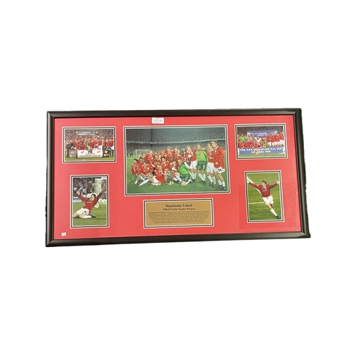 411 - A FRAMED MANCHESTER UNITED TREBLE TROPHY WINNERS PHOTO COLLAGE