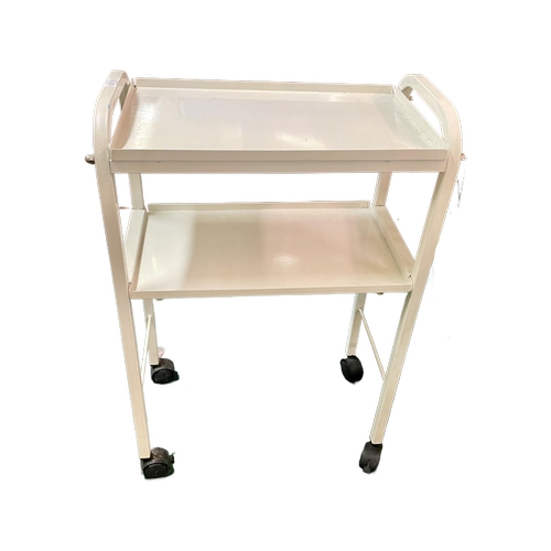 461 - A WHITE ENAMELLED THREE TIER WHEELED TROLLEY