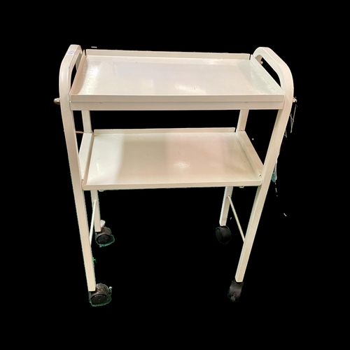 461 - A WHITE ENAMELLED THREE TIER WHEELED TROLLEY