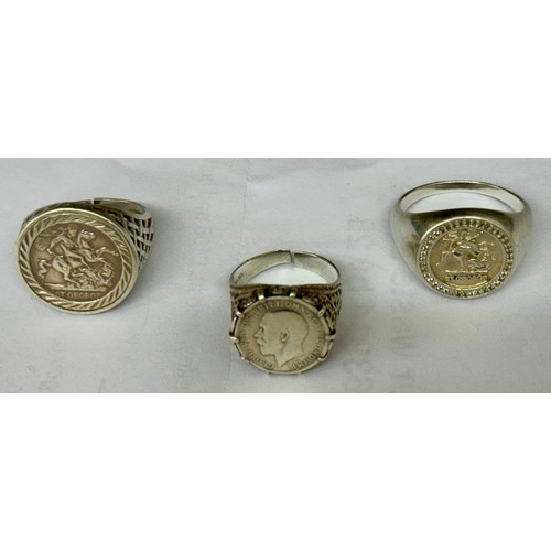 379 - THREE VINTAGE SILVER RING  - TWO BASKET RINGS WITH ST GEORGE COINS THE THIRD A SILVER BASKET SHANK W... 