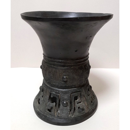 385 - AN ARCHAIC CHINESE BRONZE VASE, POSSIBLY EARLY, 12.7CM HIGH.