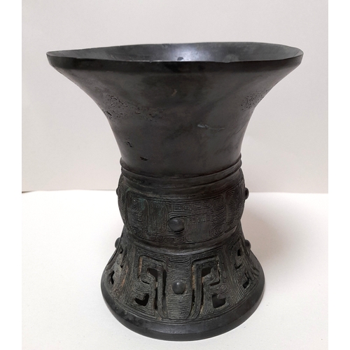 385 - AN ARCHAIC CHINESE BRONZE VASE, POSSIBLY EARLY, 12.7CM HIGH.