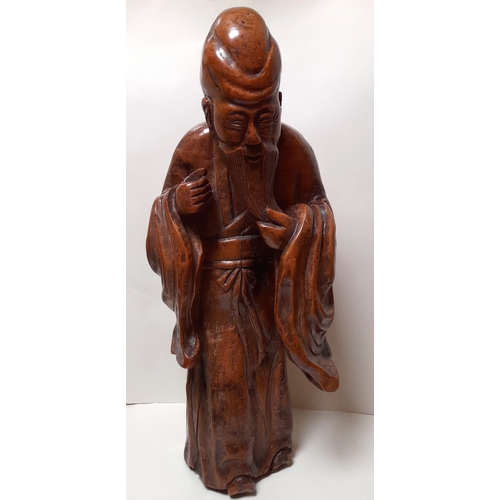 389 - A LARGE 19TH CENTURY CHINESE HARDWOOD FIGURE OF SHOU LAO, 62CM HIGH.