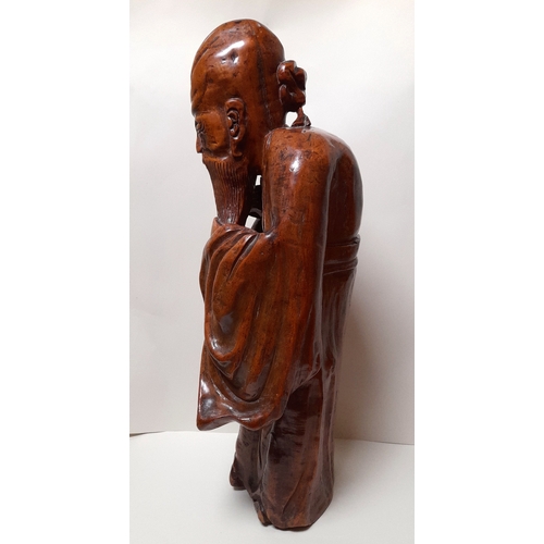 389 - A LARGE 19TH CENTURY CHINESE HARDWOOD FIGURE OF SHOU LAO, 62CM HIGH.