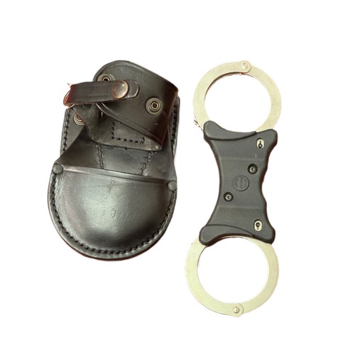 404 - A PAIR OF HIATTS CHROMED HANDCUFFS IN A PWL RCP-7 LEATHER HOLDER