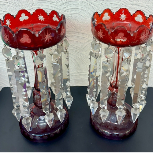 410 - A PAIR OF VICTORIAN RUBY GLASS LUSTRES, EACH WITH 10 CLEAR CRYSTAL DROPS, SHAPED BOWLS WITH TPAERED ... 