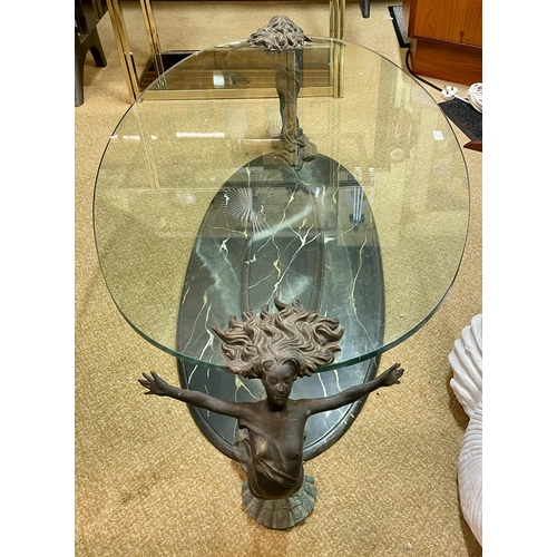 309 - AN ITALIAN OVAL GLASS AND BURNISHED MERMAID DECORATION COFFEE TABLE WITH OVAL WOODEN BASE WITH DECOR... 