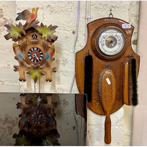 338 - A CUCKOO CLOCK - MISSING ONE FINGER AND A VINTAGE OAK SHIELD DRESSING SET WITH INBUILT BAROMETER AND... 