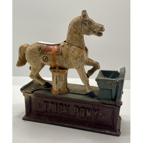 436 - A VINTAGE MECHANICAL MONEY BANK - THE TRICK PONY