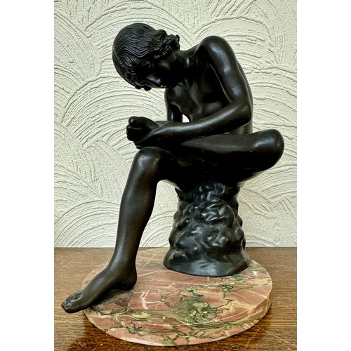 438 - A PATINATED BRONZE FIGURE IL SPINARIO AFTER THE ANTIQUE EARLY 20THC. DEPICTING A YOUTH PLUCKING A TH... 