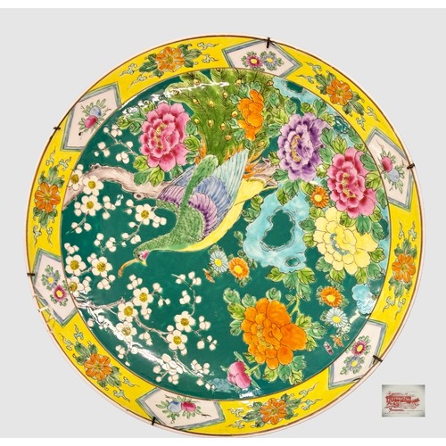 393 - A HAND PAINTED CHINESE CHARGER - FAMILLE JAUNE EDGES WITH FLORAL DESIGN TO CENTRE, BIRD AND CHRYSTAN... 