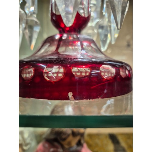 410 - A PAIR OF VICTORIAN RUBY GLASS LUSTRES, EACH WITH 10 CLEAR CRYSTAL DROPS, SHAPED BOWLS WITH TPAERED ... 