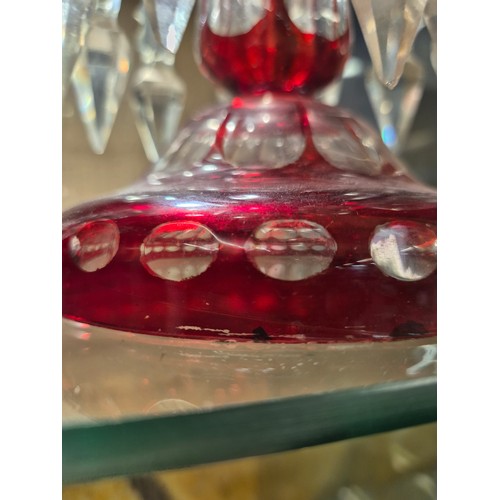 410 - A PAIR OF VICTORIAN RUBY GLASS LUSTRES, EACH WITH 10 CLEAR CRYSTAL DROPS, SHAPED BOWLS WITH TPAERED ... 