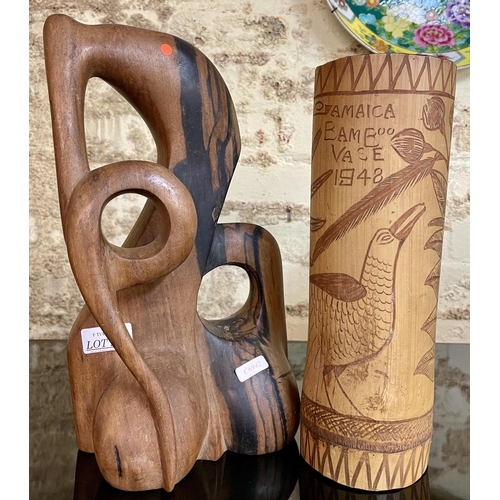 279 - A BAMBOO BRUSH POT MARKED 'JAMAICA BAMBOO VASE 1948' AND A TEAK HARDWOOD FIGURATIVE CARVING