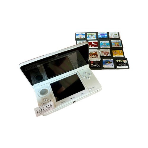 426 - A NINTENDO 3DS IN WHITE WITH X19 VARIOUS NINTENDO GAMES (ONLY ONE SPECIFICALLY FOR THE 3D DS)