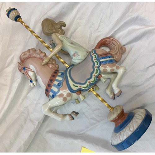 466 - LLADRO GIRL ON A CAROUSEL HORSE WITH ORIGINAL LLADRO BOX
Designer: Jose Puche
Year Designed: 1985
Ye... 