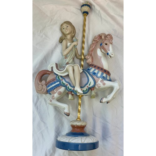 466 - LLADRO GIRL ON A CAROUSEL HORSE WITH ORIGINAL LLADRO BOX
Designer: Jose Puche
Year Designed: 1985
Ye... 