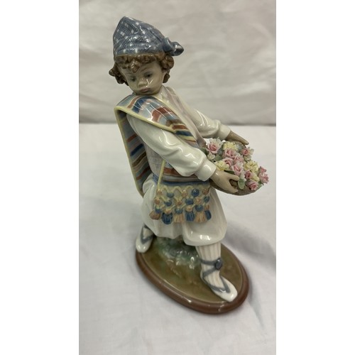 485 - SIGNED LLADRO 1526 VALENCIAN FLOWERS -BOY CARRYING FLOWERS Sculptor: Antonio Ramos Issued in 1987 an... 