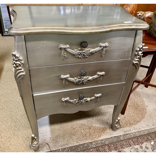 335 - A SILVER VENEERED LOUIS STYLE CHEST OF 3 DRAWERS - ORNAMENTAL ADORNMENTS TO FACIAS WITH CIRCULAR MET... 