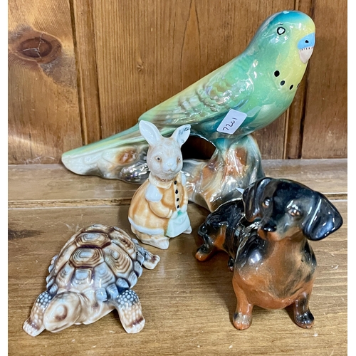 344 - A KSP BUDGERIGAR LUSTRE FIGURE, A WADE TORTOISE, A BESWICK DACHSHUND AND A RABBIT FIGURE