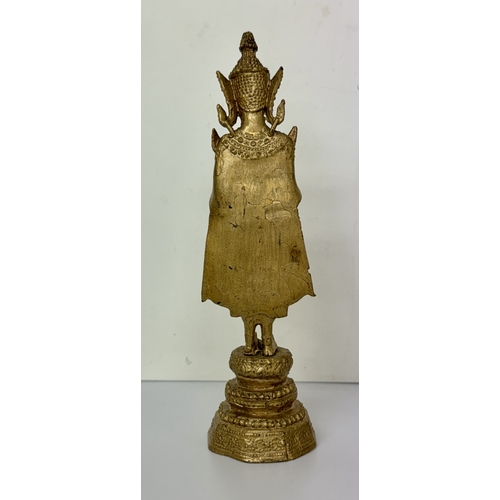 410 - A GILT BRONZE BUDDHA FIGURE  - THAI LATE 19TH;/EARLY 20TH C. H: 16.7CMS WT:225GRAMS