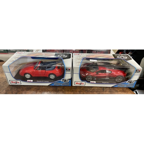 306 - 2X MAISTO SPECIAL EDITION DIECAST METAL CARS, BUGATTI AND PORSCHE DMG PACKAGING