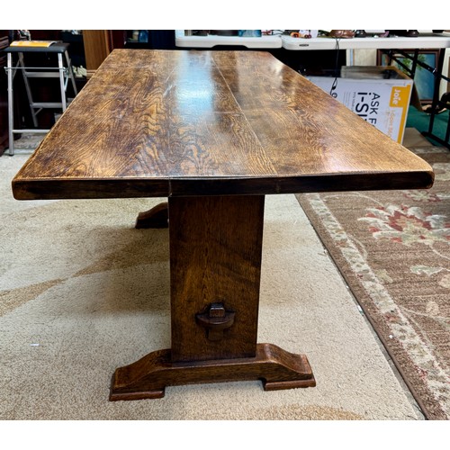 322 - A PLANK OAK REFECTORY DINING TABLE -A RECTANGULAR DINING TABLE OF OAK PLANK CONSTRUCTION ON A RAISED... 