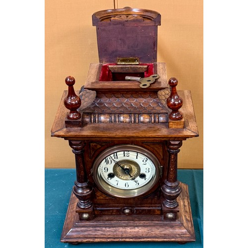 331 - A JUNGHANS BLACK FOREST 8-DAY MANTEL CLOCK WITH LIFT TOP FOR KEY SAFE -ELBORATE CASE APPROX 45CM H X... 