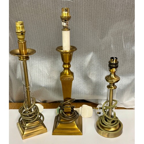 392 - THREE (3) MODERN BRASS COLUMN TABLE LAMPS - 2 WITH GLASS SHEATHS THE OTHER COLUMNAR -ALL MODERN WIRE... 