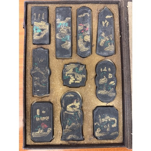 426 - A SET OF 10 CHINESE INK BLOCKS CASED -EACH BLOCK WITH A DESCRIPTION TO THE REAR- THE COVER MARKED 'T... 