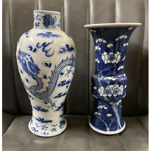 423 - TWO 19TH CENTURY CHINESE BLUE & WHITE VASES - H:22CMS & 19.5CMS ONE WITH DRAGON DESIGN AND THE OTHER... 