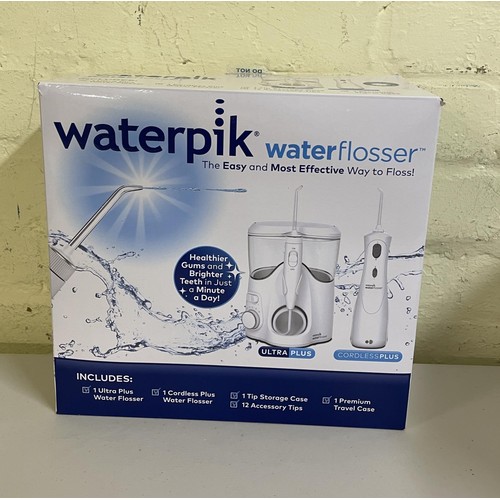 18 - BOXED WATERPIK WATER FLOSSER WITH ULTRA PLUS/CORDLESS PLUS WITH ACCESSORIES