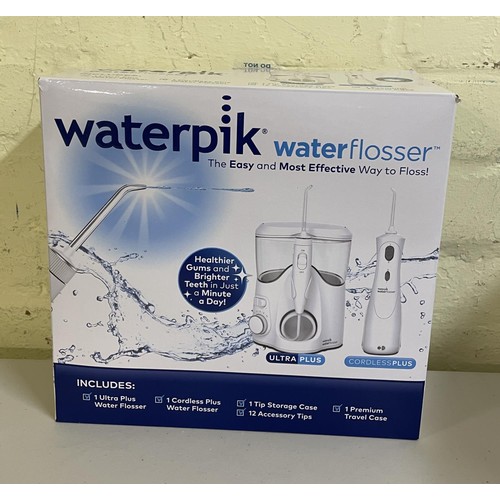 19 - BOXED WATERPIK WATER FLOSSER WITH ULTRA PLUS/CORDLESS PLUS WITH ACCESSORIES