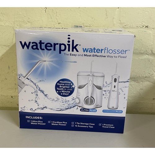 20 - BOXED WATERPIK WATER FLOSSER WITH ULTRA PLUS/CORDLESS PLUS WITH ACCESSORIES