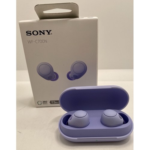 10 - BOXED PAIR OF SONY WF-C700N WIRELESS EAR BUDS WITH CHARGING WIRE AND EXTRA BUDS - IN LILAC