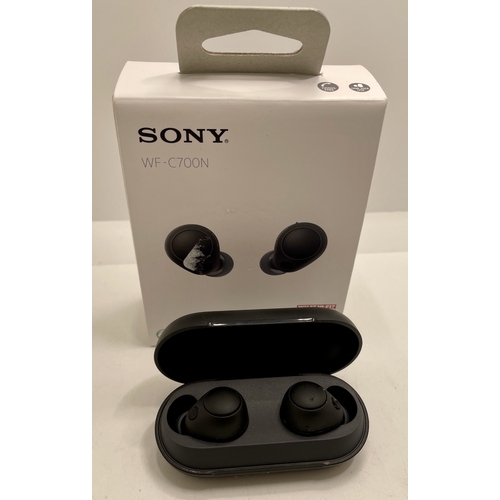 7 - BOXED PAIR OF SONY WF-C700N WIRELESS EAR BUDS WITH CHARGING WIRE AND EXTRA BUDS - IN BLACK