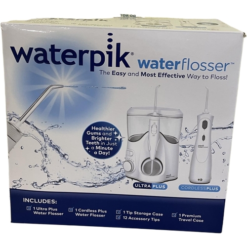 19 - BOXED WATERPIK WATER FLOSSER WITH ULTRA PLUS/CORDLESS PLUS WITH ACCESSORIES