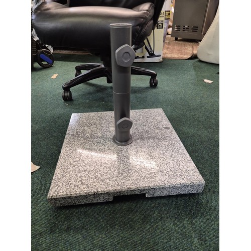 220 - GRANITE ROLLING PARASOL BASE - NOTE ONE WHEEL DETACHED BUT PRESENT