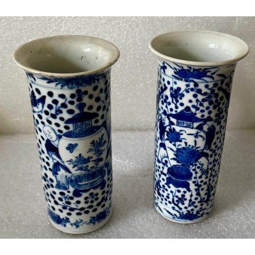 286 - TWO BLUE & WHITE CHINESE CYLINDRICAL VASES -EACH DECORATED WITH FIGURES HOLDING LIDDED VASES - WITH ... 