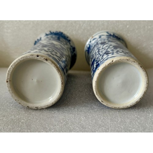 286 - TWO BLUE & WHITE CHINESE CYLINDRICAL VASES -EACH DECORATED WITH FIGURES HOLDING LIDDED VASES - WITH ... 