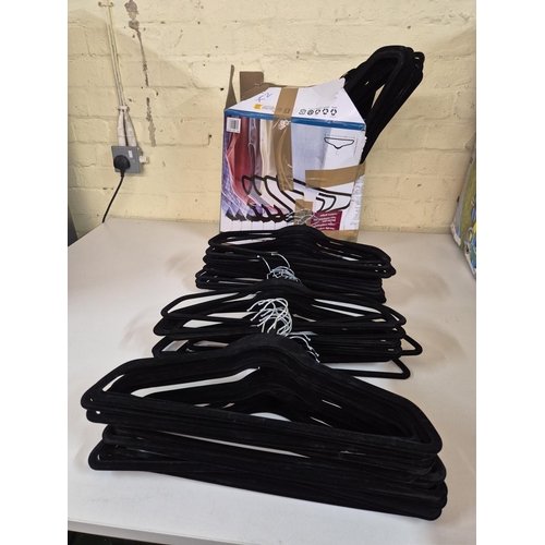 86 - LARGE QTY OF NON SLIP HANGERS - APPROX 60