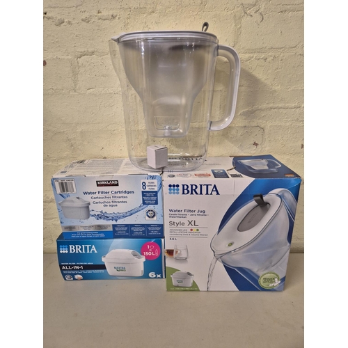 97 - BOXED BRITA XL 3.6L WATER FILTER JUG TOGETHER WITH 4X BRITA FILTERS AND 7X KIRKLAND FILTERS