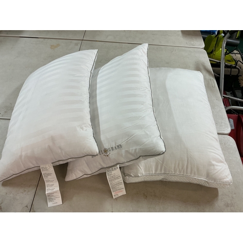 87 - SET OF 2 HOTEL GRAND DOWN FILLED PILLOWS AND ONE OTHER (ONE OTHER HAS SLIGHT SHOP SOILING)