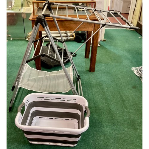 104 - FOLDING CLOTHES AIRER TOGETHER WITH AN ADDIS COLLAPSING LAUNDRY BASKET