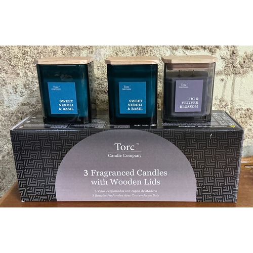 35 - BOXED SET OF THREE TORC CANDLE COMPANY CANDLES WITH WOODEN LIDS - 2X SWEET NEROLI AND BASIL AND 1 FI... 